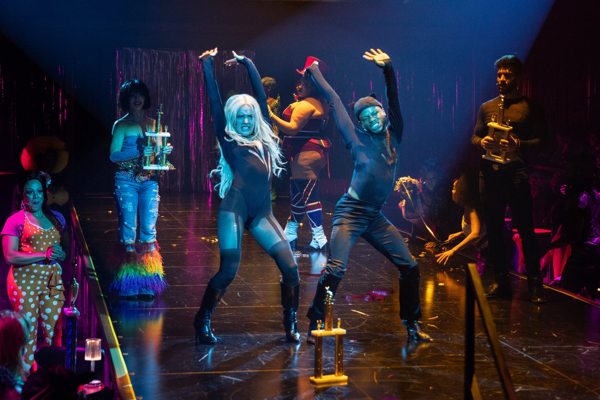 Cats musical stage performance with dramatic lighting